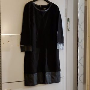 black dress with pleather trim